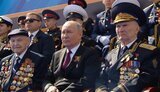 путін