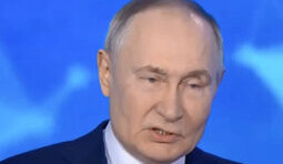 путін