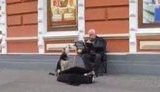 собака
