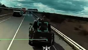 Ukrainian attack drone eliminates Russian army mobile fire group gunner while pickup truck fitted with machine gun is moving. VIDEO