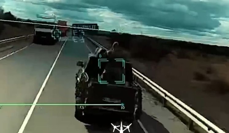 Ukrainian attack drone eliminates Russian army mobile fire group gunner while pickup truck fitted with machine gun is moving. VIDEO