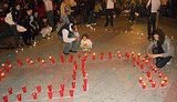 Крымские татары в Симферополе выложили свечами слово "геноцид". ФОТОрепортаж
