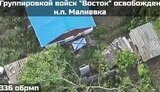 Russians waving their flag in Maliivka destroyed