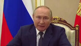 путін