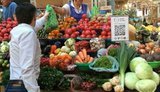 На Бессарабском рынке тестируют оплату криптовалютой. ФОТО