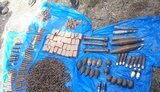 Гранаты, гранатометные выстрелы и 3 тыс. патронов: СБУ обнаружила вблизи линии разграничения тайник боевика "ДНР" Пятнашки. ФОТОрепортаж